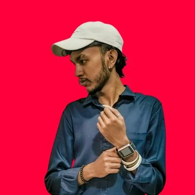Ashen Ranasingha wearing a cap and a blue shirt